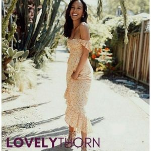 TIARE HAWAII  // hi low off shoulder floral ruffle